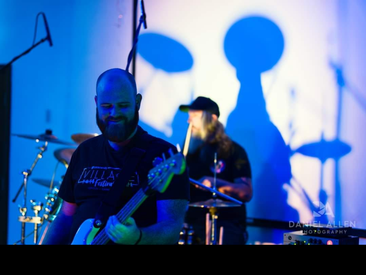 Last Chance Saloon band member performing