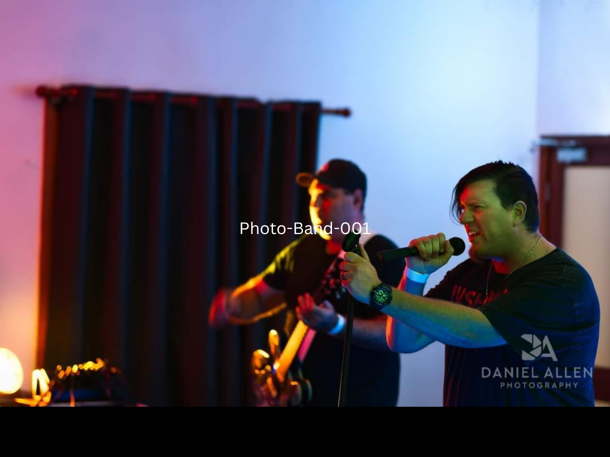 Last Chance Saloon band member on stage