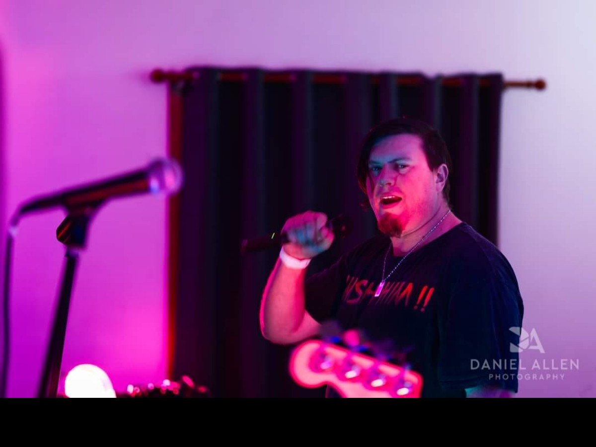 Last Chance Saloon band member performing