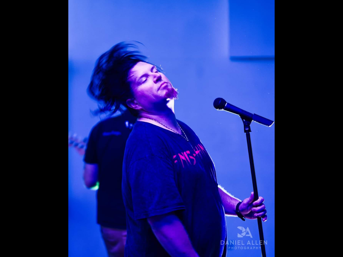 Last Chance Saloon guitarist performing